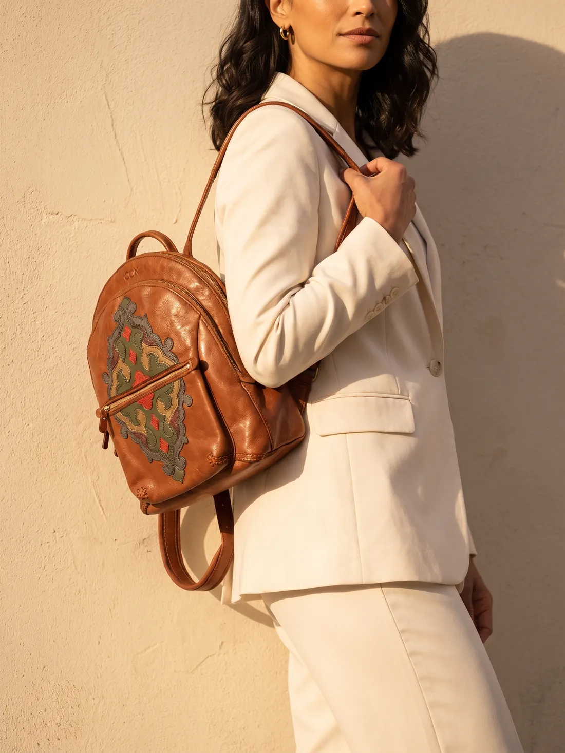 GÖN Handmade Lav Backpack worn — carried in Tan, from the campaign