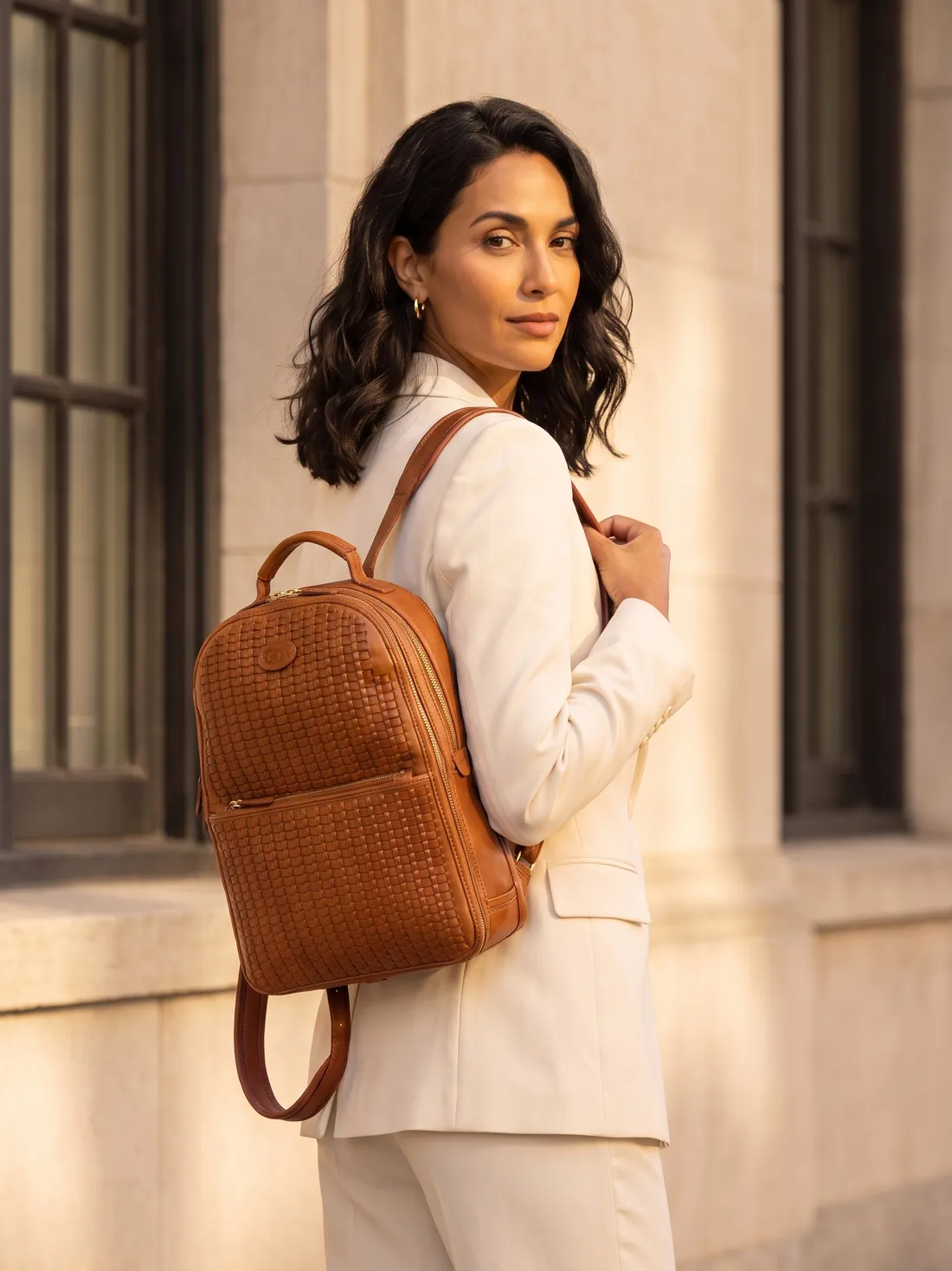 GÖN Handmade Can Backpack worn — carried in Tan, from the campaign