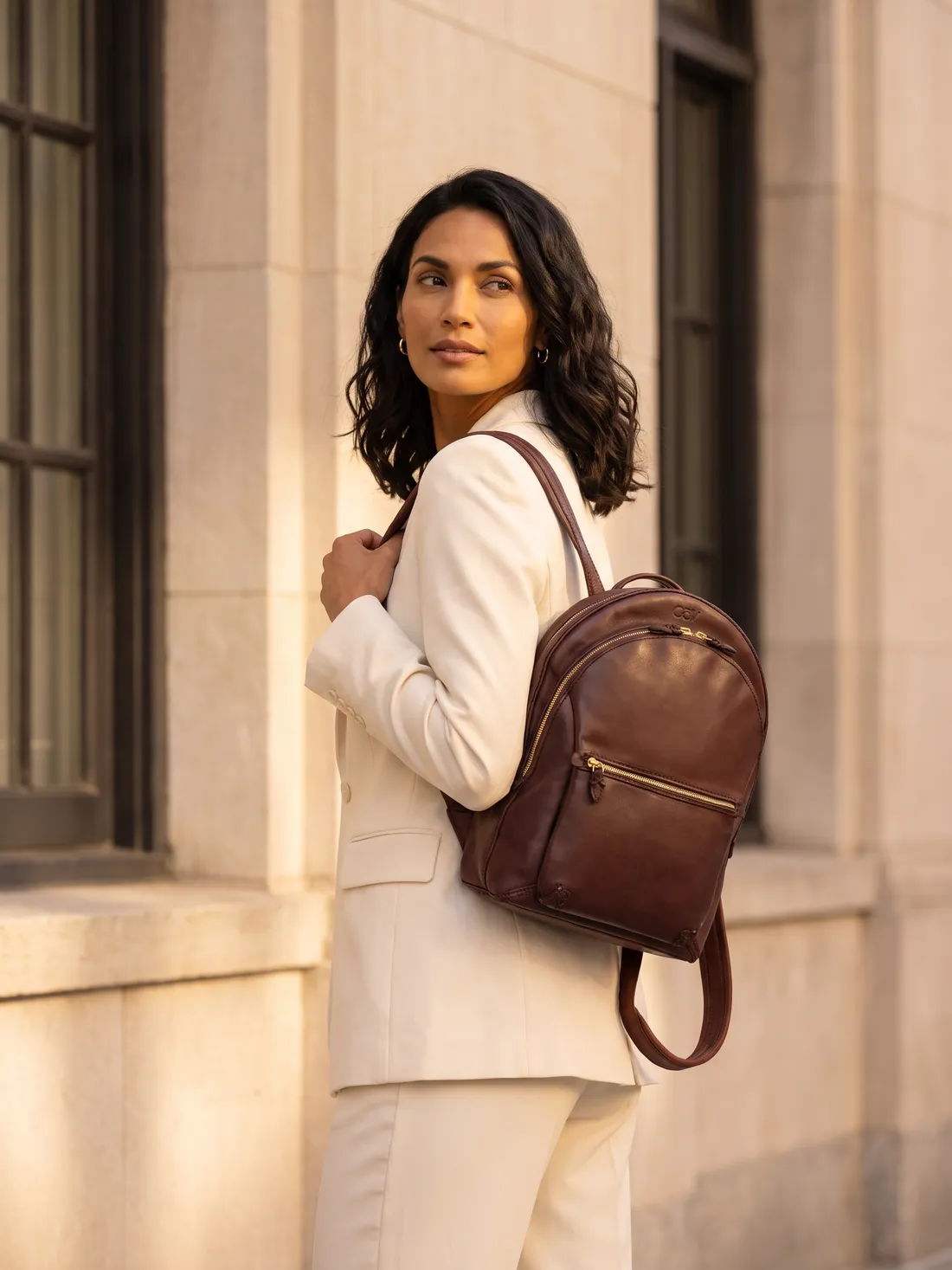 GÖN Handmade City Zip Backpack worn — carried in Coffee, from the campaign