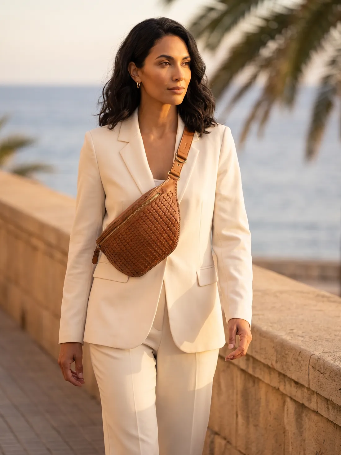 GÖN Handmade Toga Belt Bag worn — carried in Tan, from the campaign