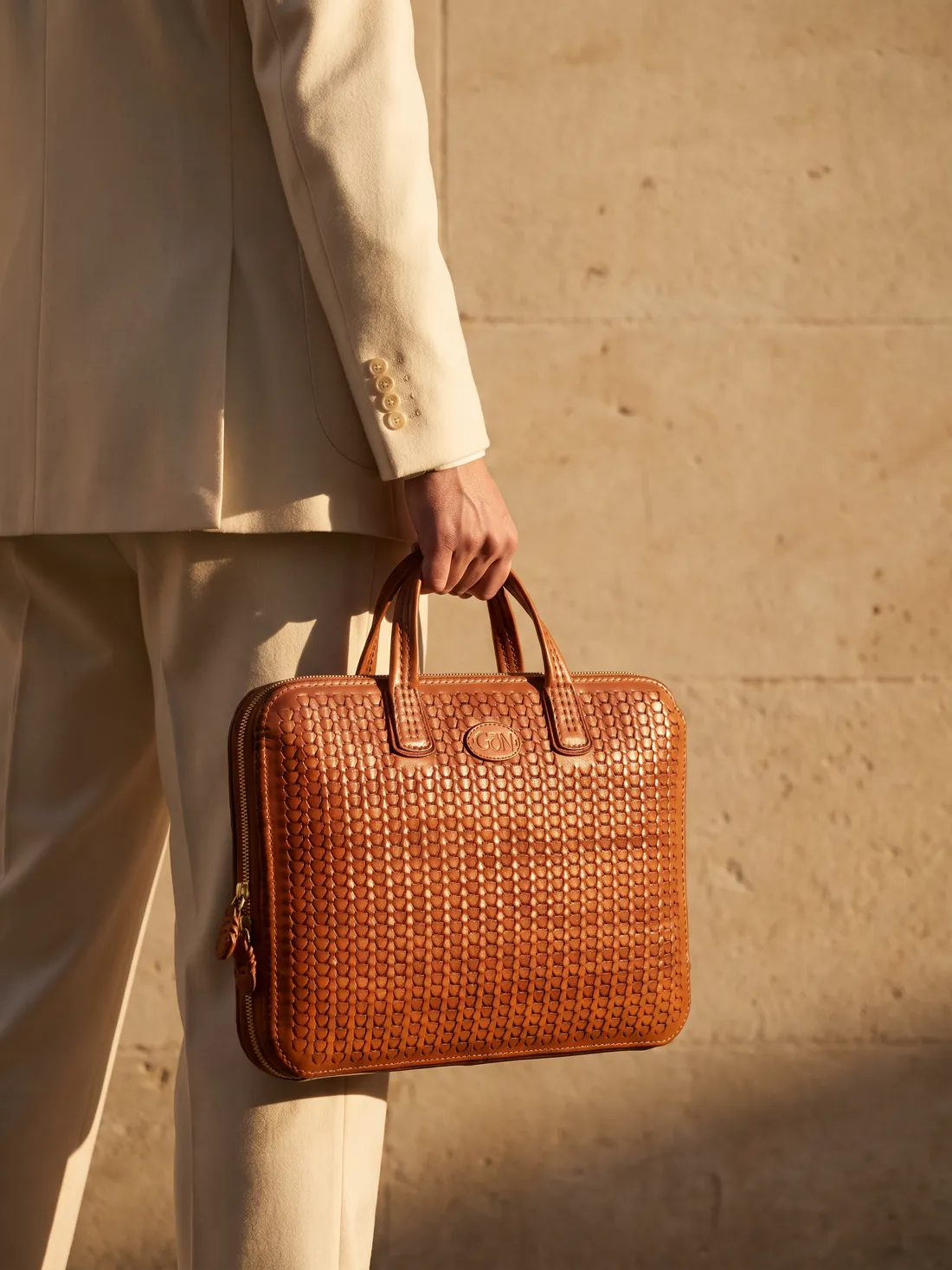 GÖN Handmade Detam Briefcase worn — carried in Tan, from the campaign