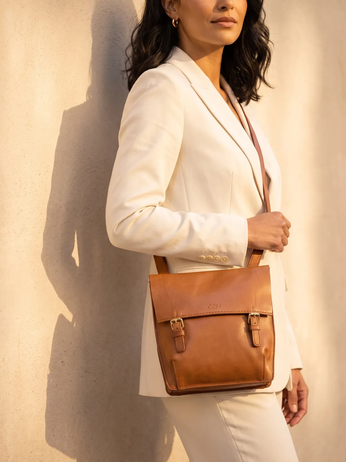 GÖN Handmade Leleg Crossbody Bag worn — carried in Tan, from the campaign