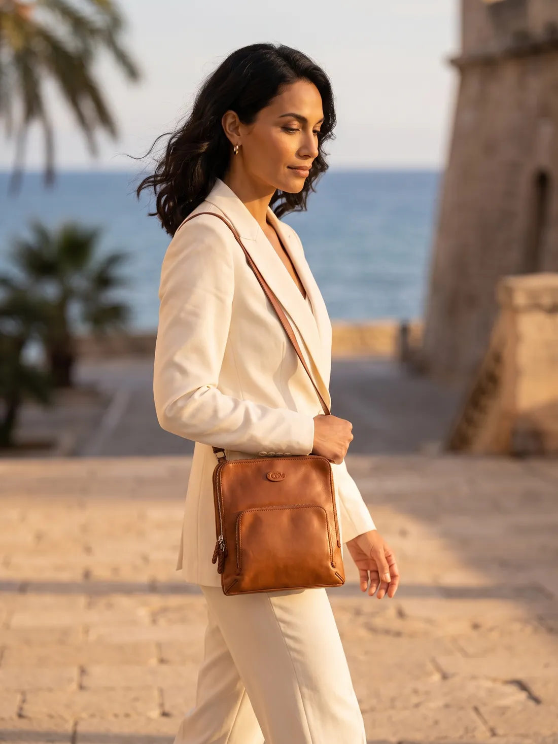 GÖN Handmade Ove Crossbody Bag worn — carried in Tan, from the campaign