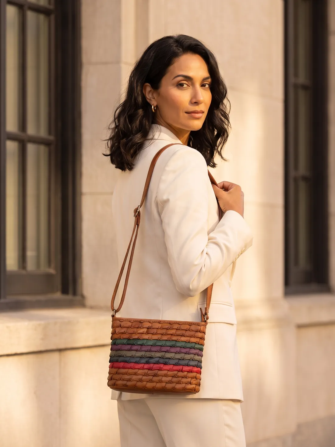 GÖN Handmade Mut Bucket Bag worn — carried in Tan, from the campaign