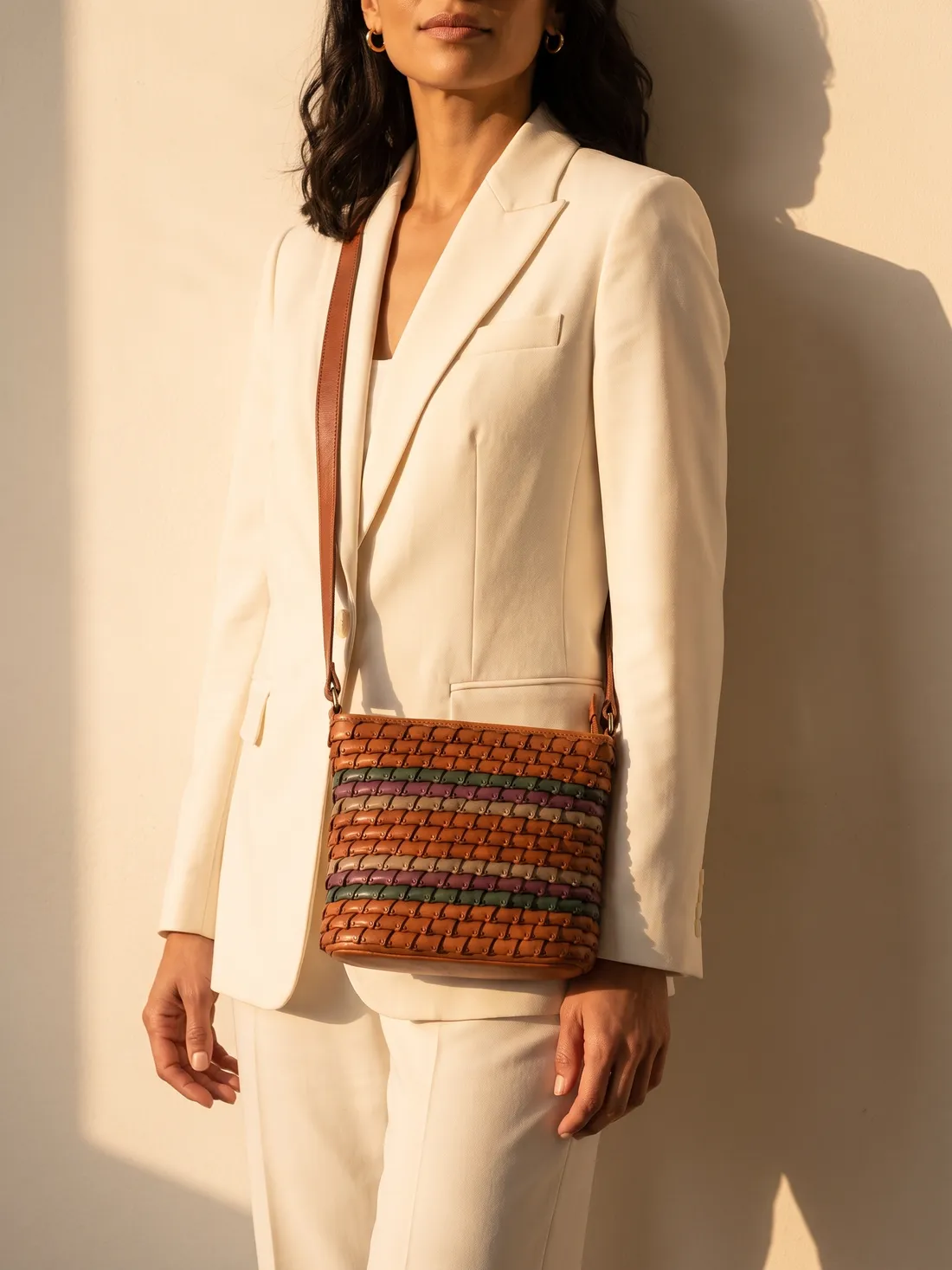 GÖN Handmade Nus Bucket Bag worn — carried in Tan, from the campaign