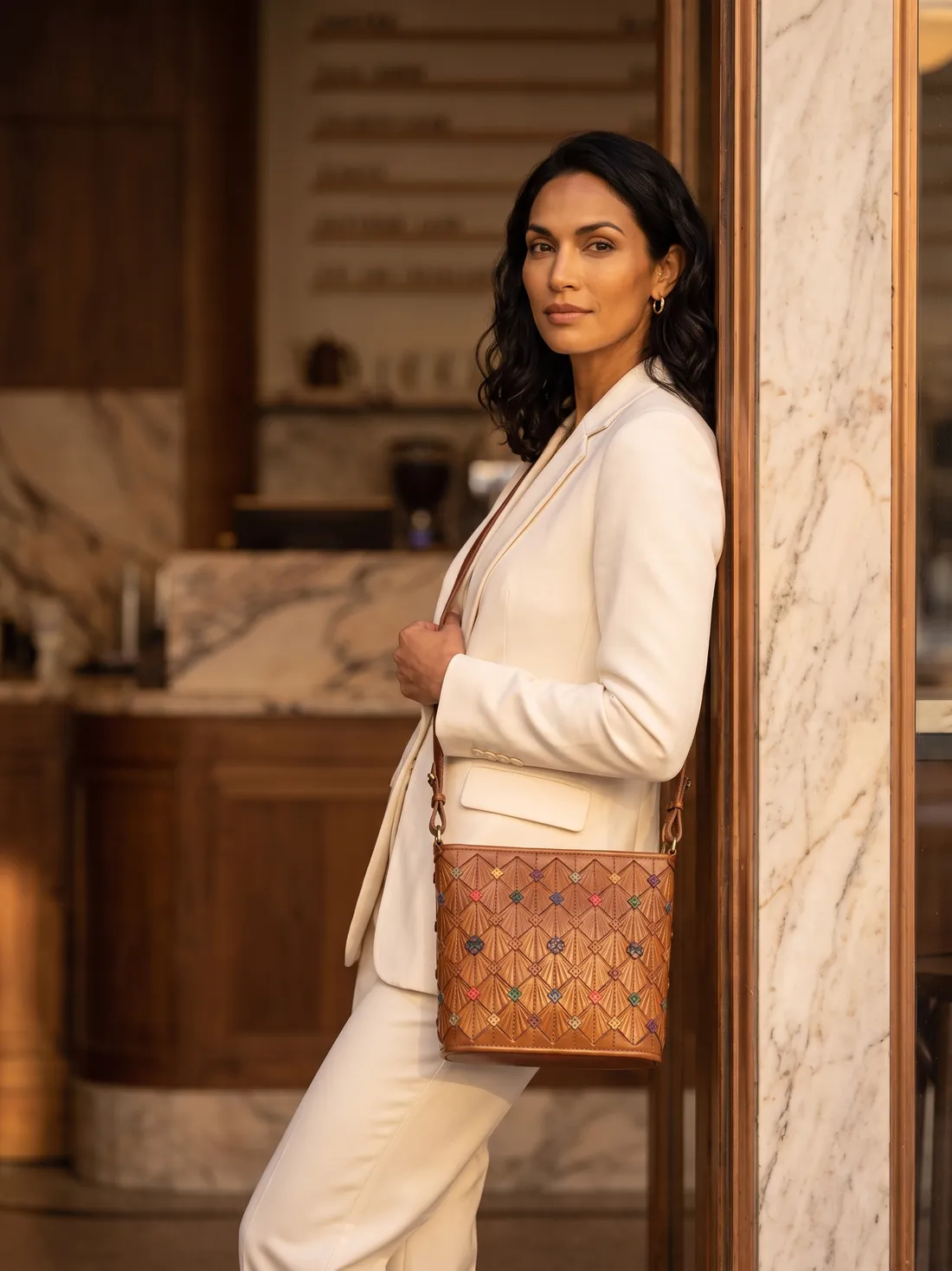 GÖN Handmade Kristal Bucket Bag worn — carried in Tan, from the campaign