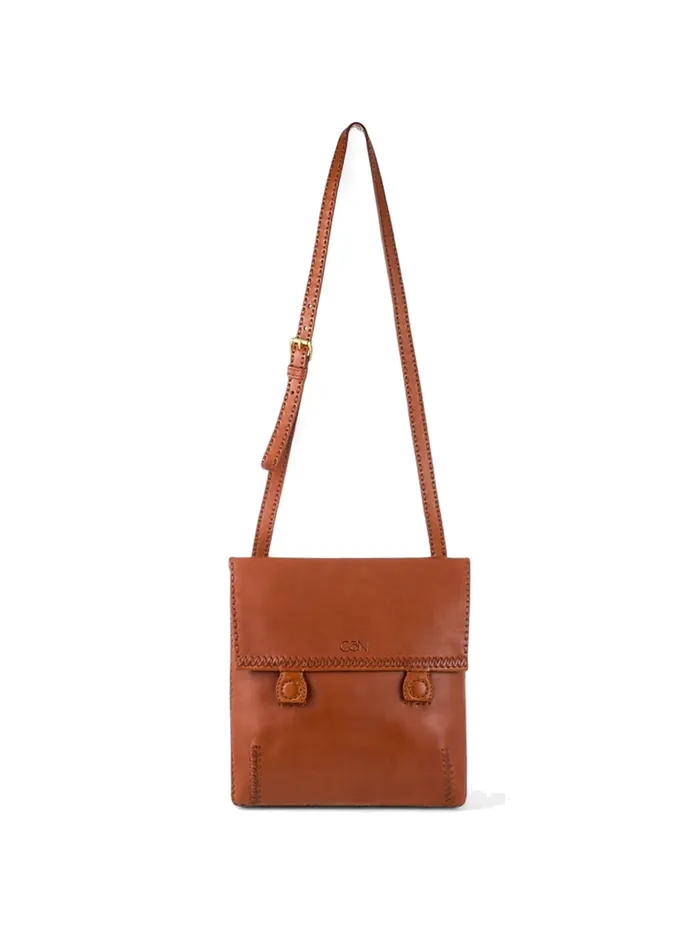 GÖN tan leather flap crossbody bag with hand-laced trim and long adjustable strap