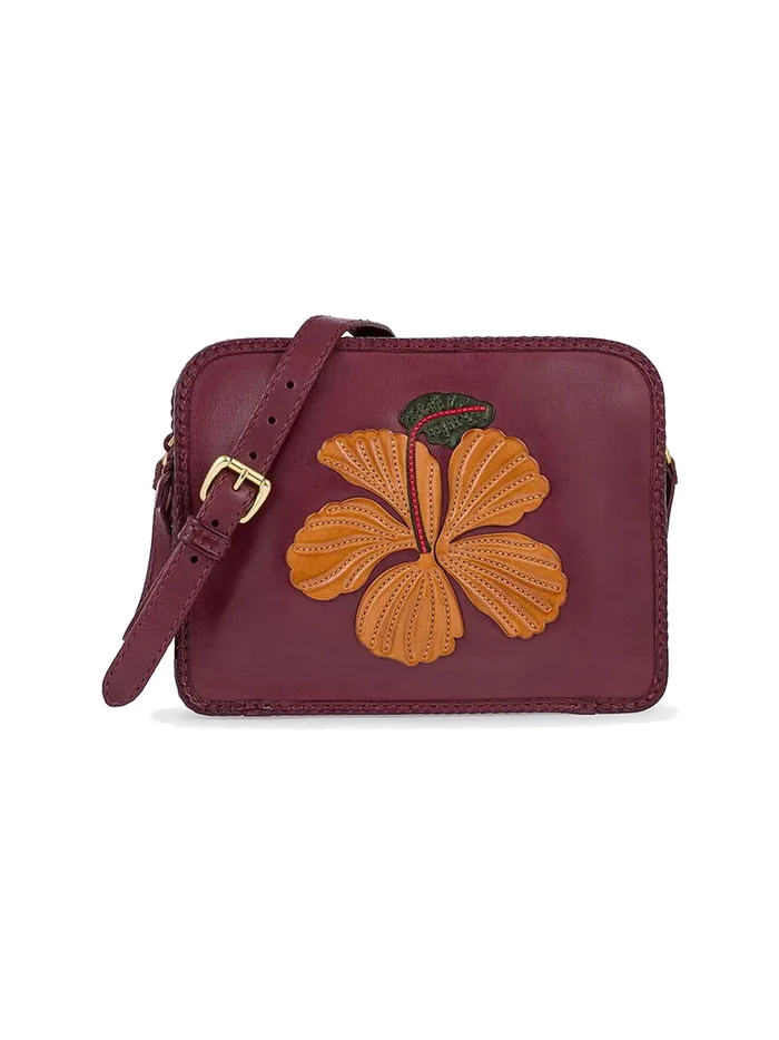 GÖN plum leather crossbody bag with flower appliqué