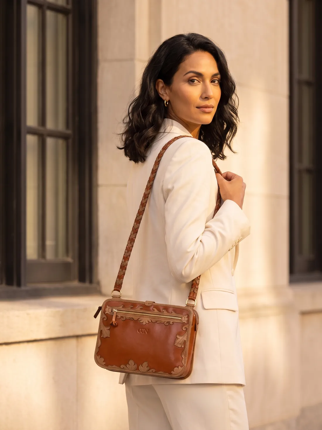 GÖN Handmade Braided-Strap Camera Bag worn — carried in Tan-Black, from the campaign