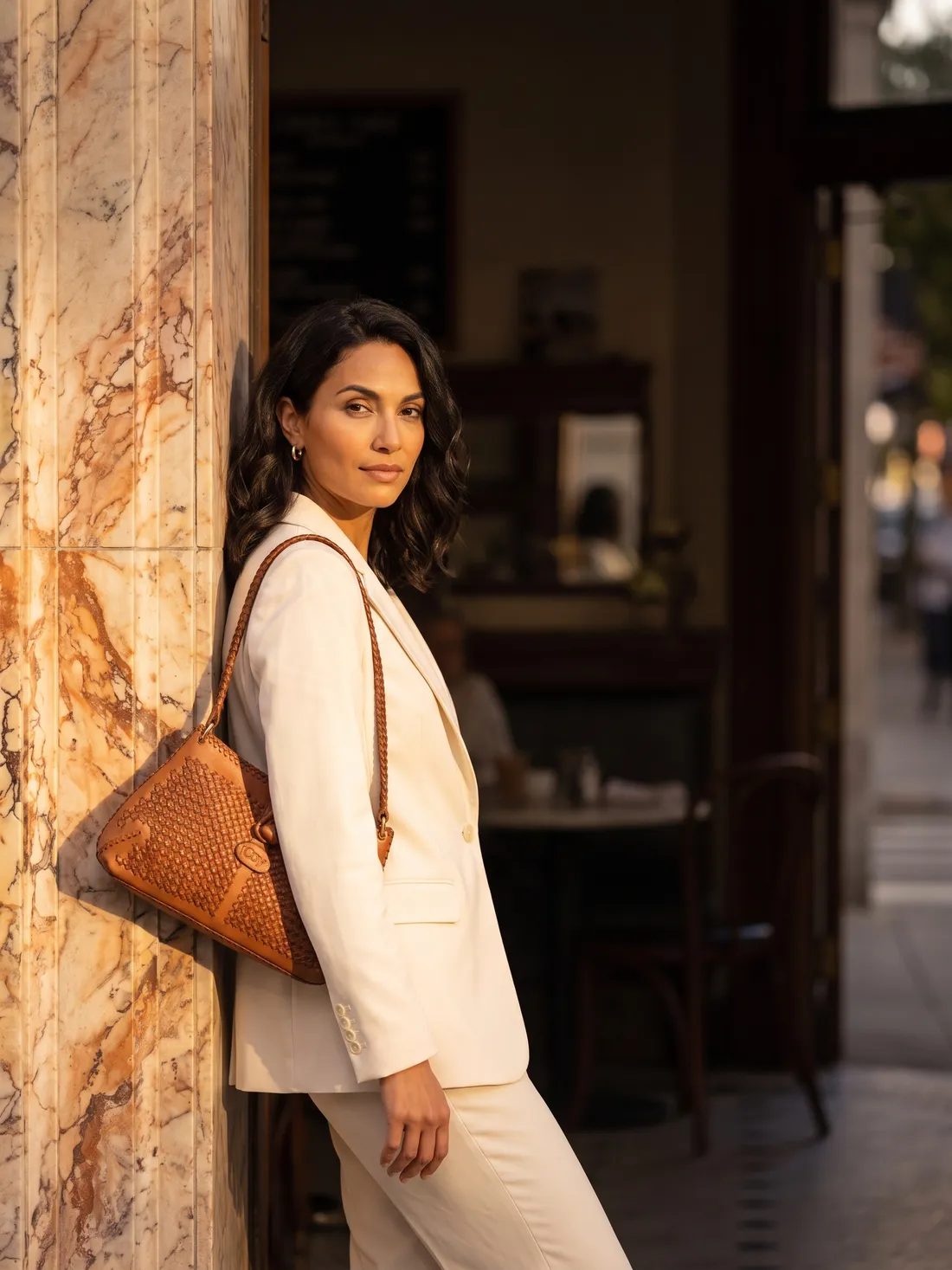 GÖN Handmade Kapril Shoulder Bag worn — carried in Tan, from the campaign