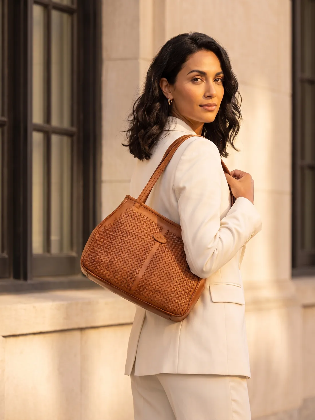 GÖN Handmade Sak Tote worn — carried in Tan, from the campaign