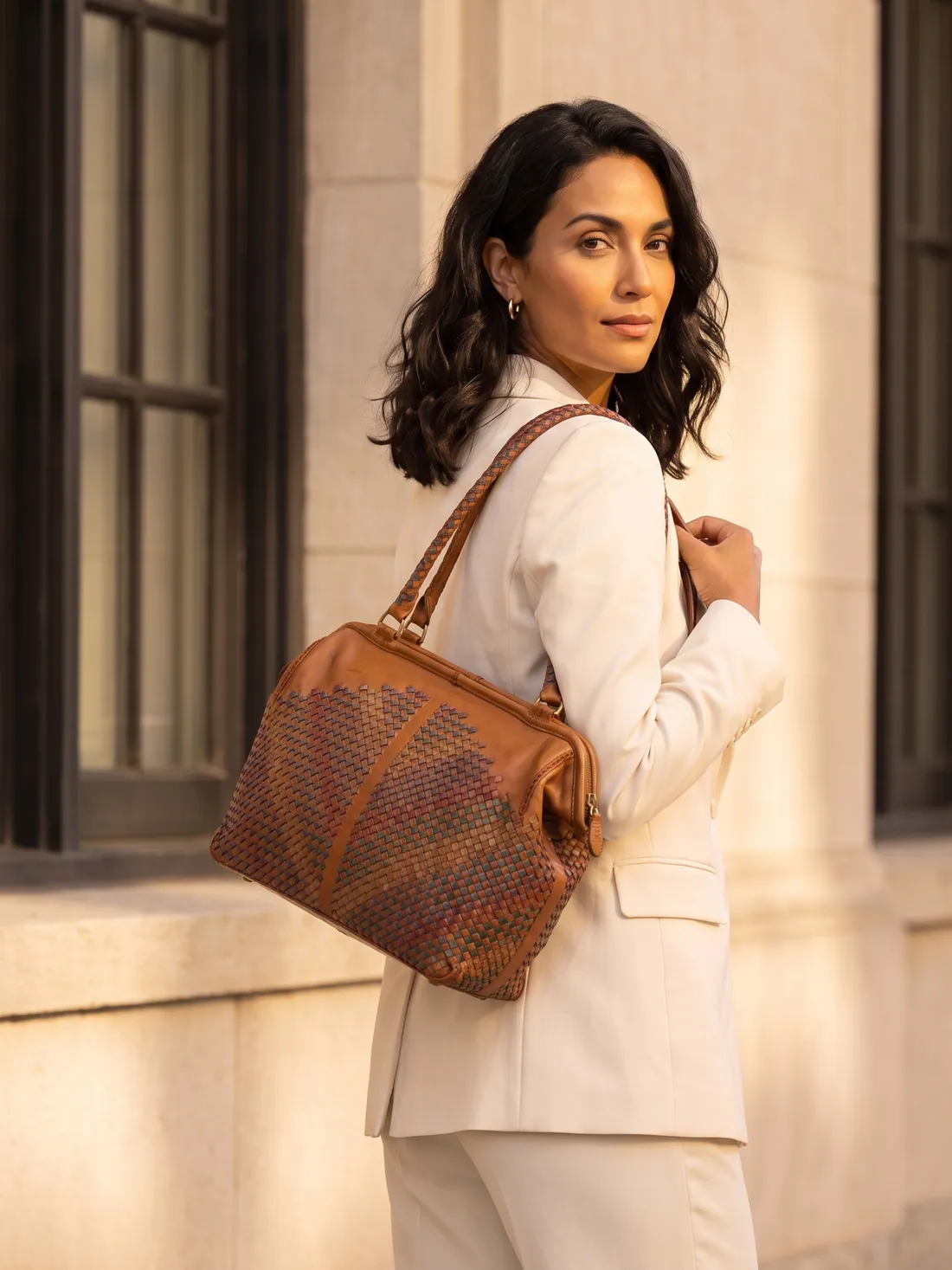 GÖN Handmade Tula Handbag worn — carried in Tan, from the campaign