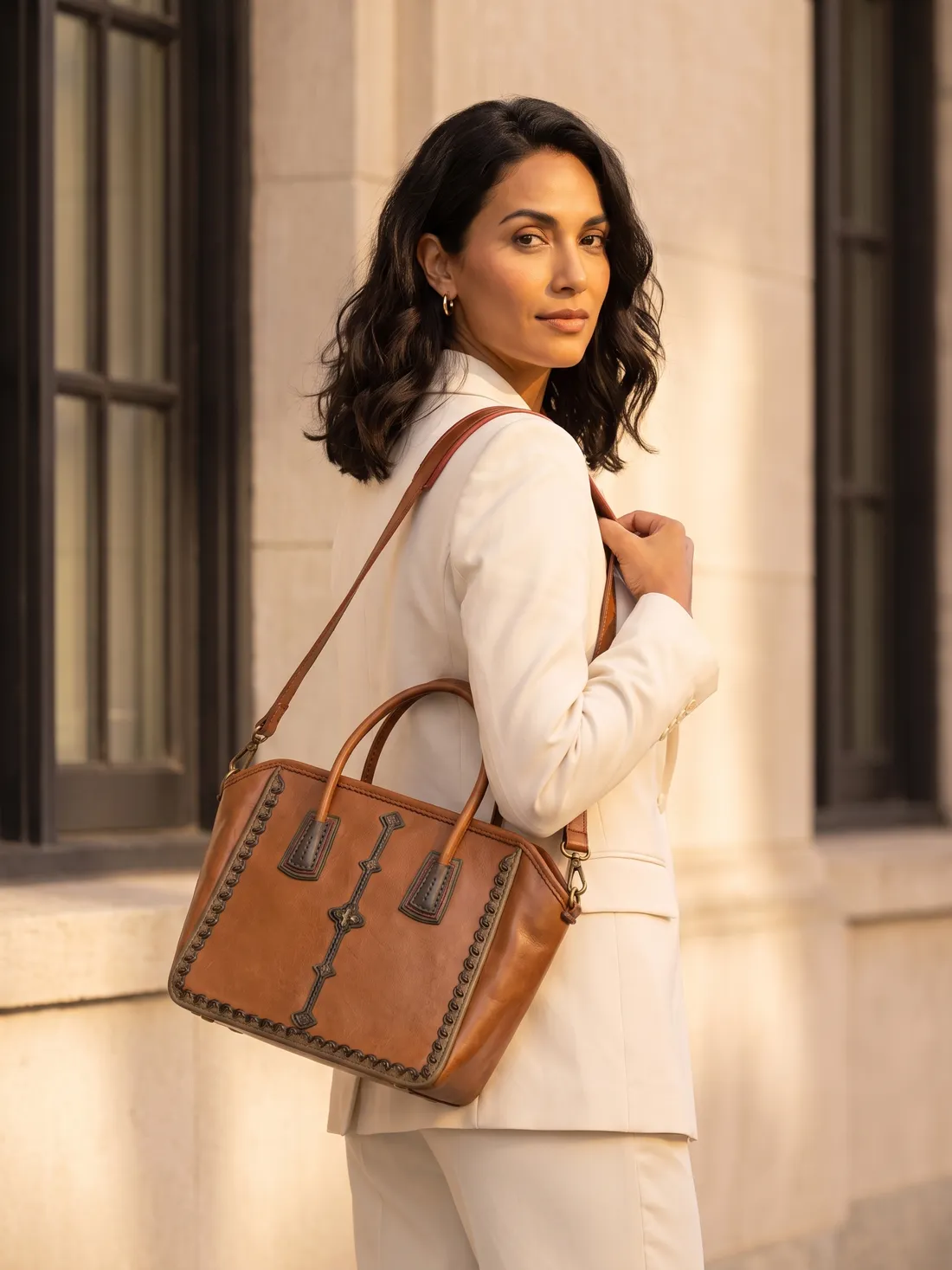 GÖN Handmade Bicek Handbag worn — carried in Tan, from the campaign