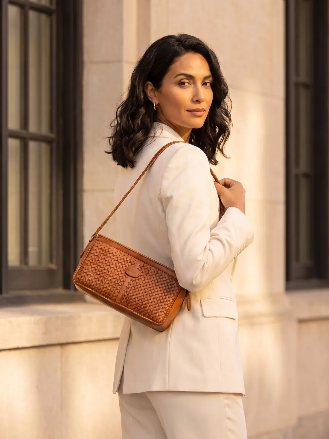 GÖN Handmade Yan Shoulder Bag worn — carried in Tan, from the campaign