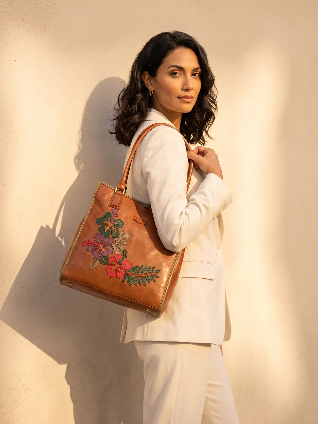 GÖN Handmade Kurun Tote worn — carried in Tan, from the campaign
