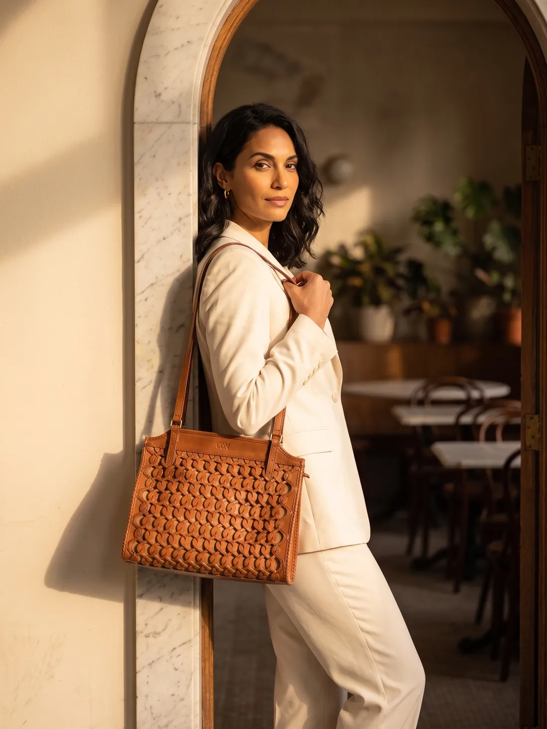 GÖN Handmade Kipe Shoulder Bag worn — carried in Tan, from the campaign